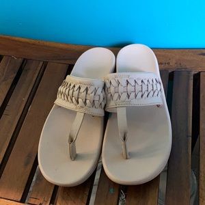 Nike nude flip flops, size 7